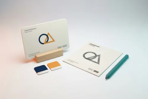 Logo design service: monogram on a presentation card with swatches and sketch