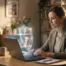 Small business owner working on a laptop with a glowing digital shield symbolizing website security